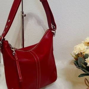 Coach bucket bag, beautiful red leather with signature jacquard inside.